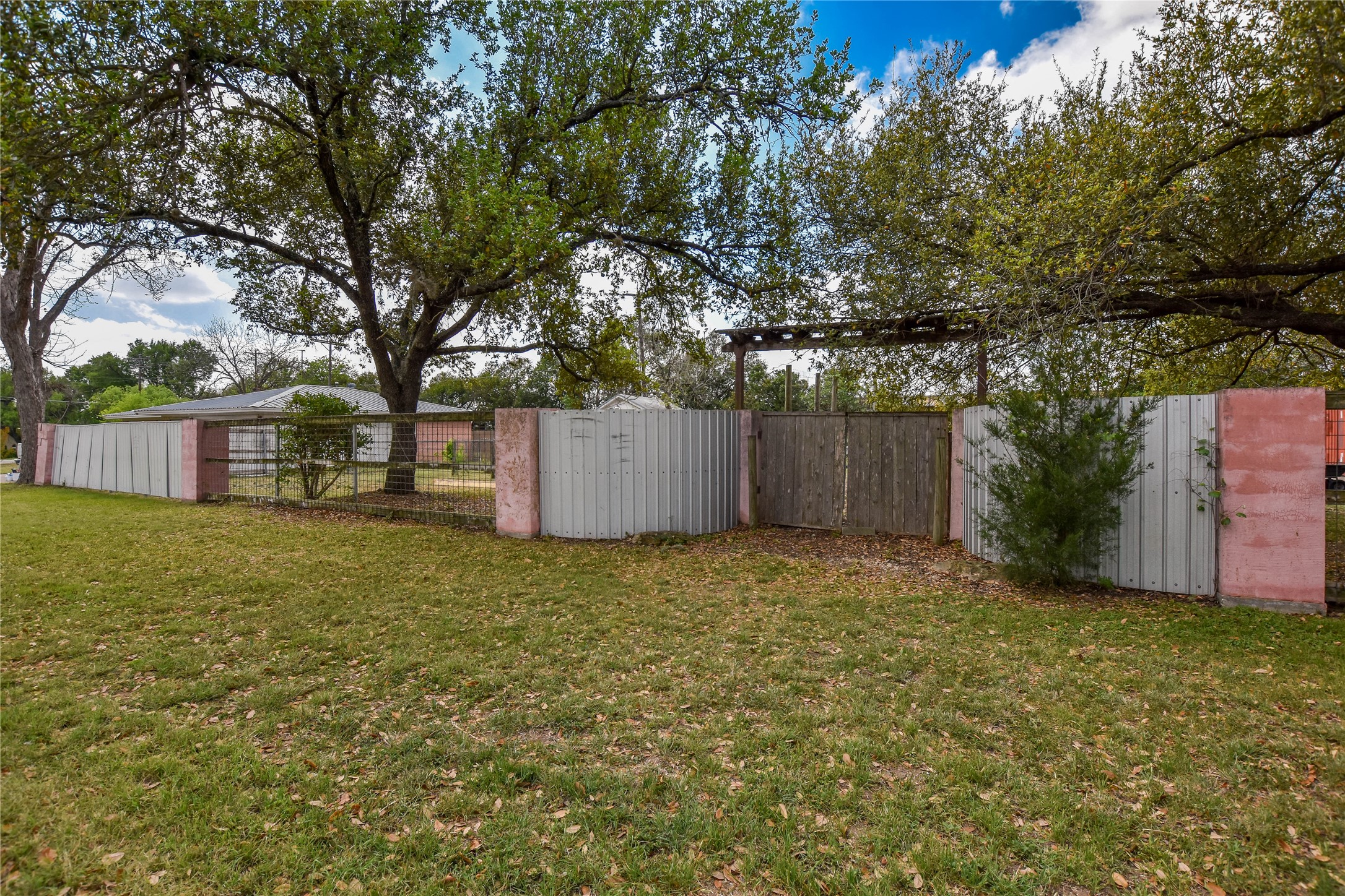 3317 Bosque Lane Austin, TX 78754 - Photo 3 of 18 a house with trees in front of it