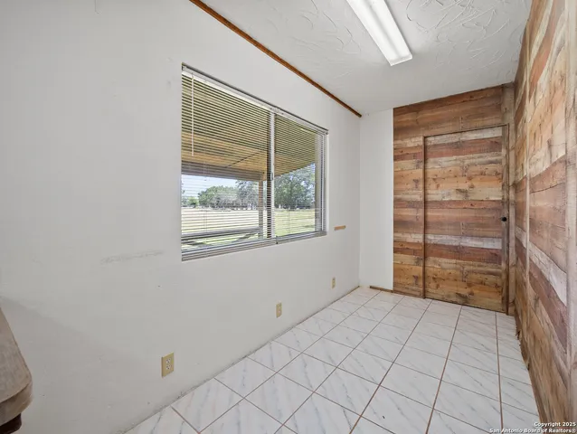 a view of an empty room with window