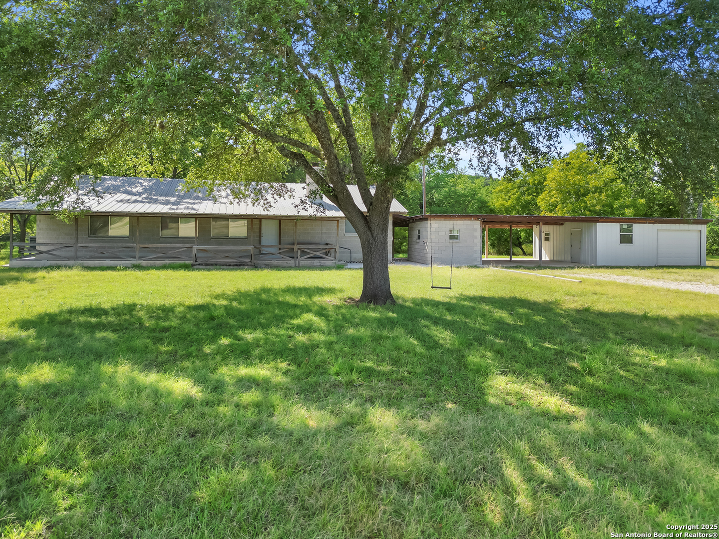710 Chipman Lane Bandera, TX 78003 - Photo 19 of 42 a view of swimming pool with an outdoor space and seating area
