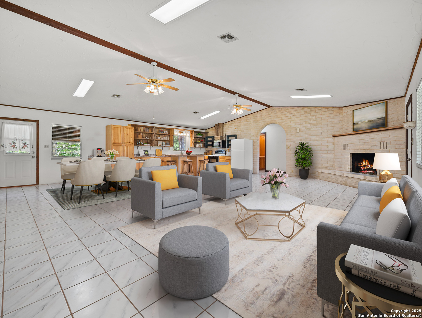 710 Chipman Lane Bandera, TX 78003 - Photo 2 of 42 a living room with furniture and a fireplace