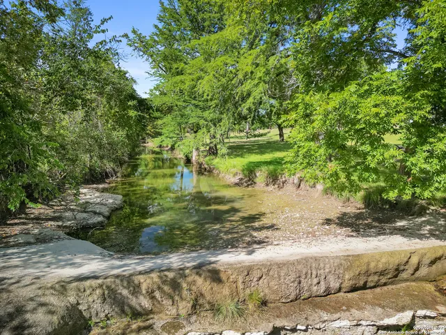 a view of a road with a yard