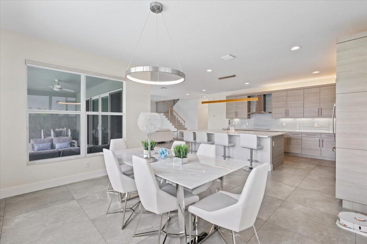 15377 Green River Court Delray Beach, FL 33446 - Photo 12 of 49 a view of a dining room with furniture