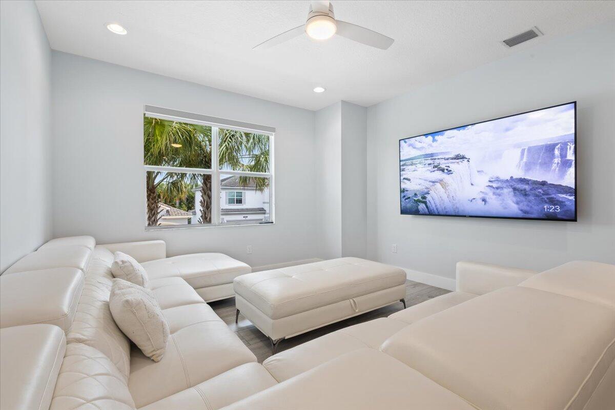 15377 Green River Court Delray Beach, FL 33446 - Photo 22 of 49 a bedroom with two large bed and a large window