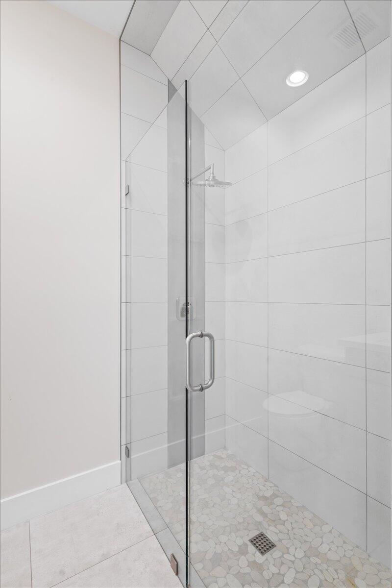 15377 Green River Court Delray Beach, FL 33446 - Photo 25 of 49 a bathroom with a shower