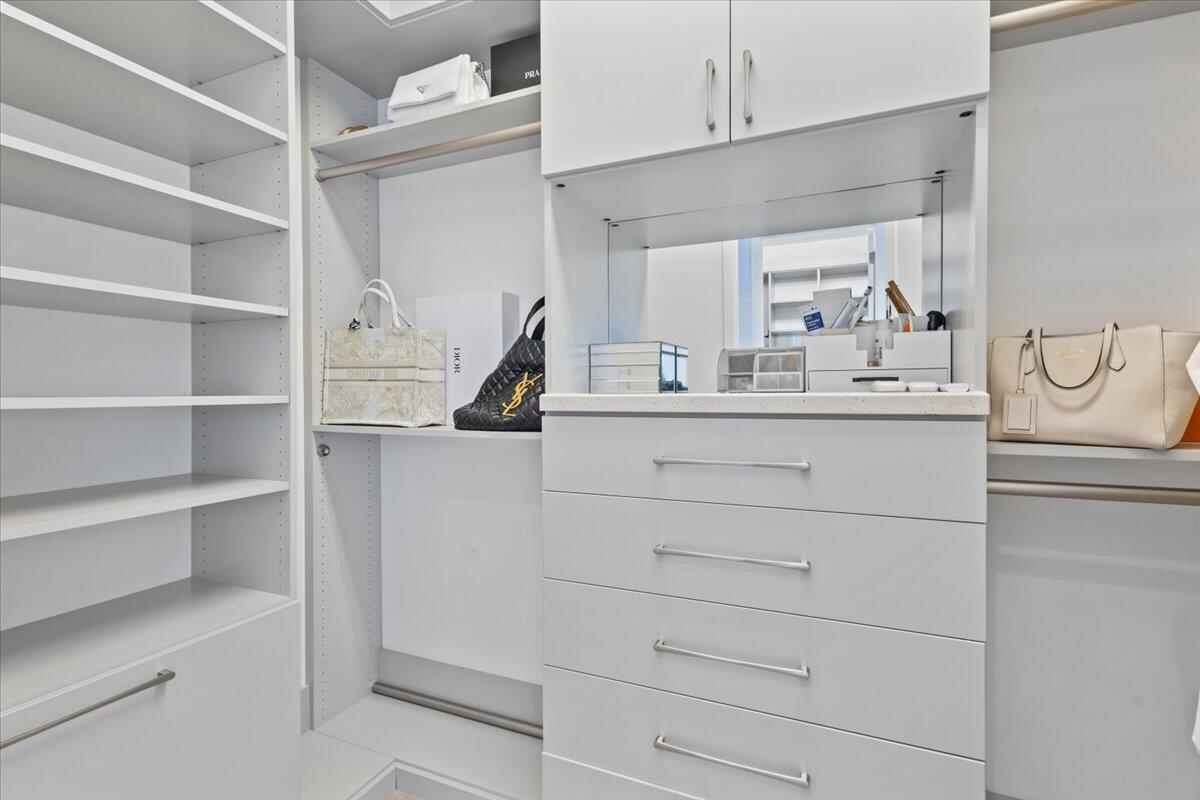 15377 Green River Court Delray Beach, FL 33446 - Photo 27 of 49 a kitchen with a refrigerator and a sink