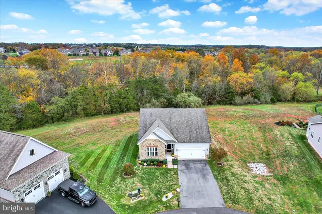 a view of lake from deck and yard