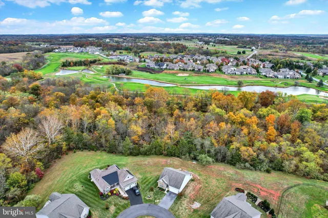 an aerial view of a house with a garden