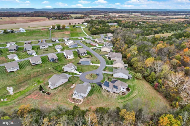 an aerial view of a house with a outdoor space