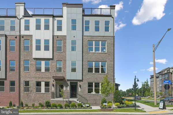 a front view of a building with street view