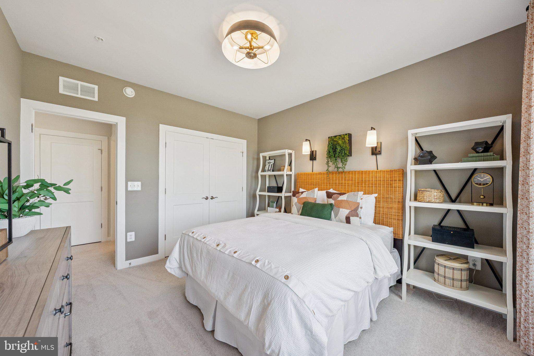 8702 Lovelace Street Manassas, VA 20110 - Photo 24 of 27 a bedroom with a bed and a window