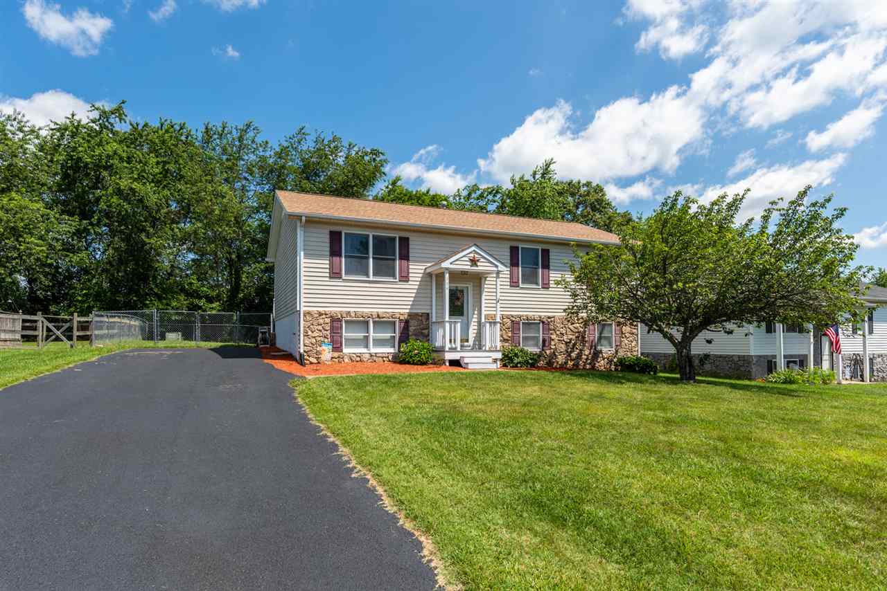 104 Buckboard Road Waynesboro, VA 22980 - Photo 2 of 43 a front view of a house with a garden and trees