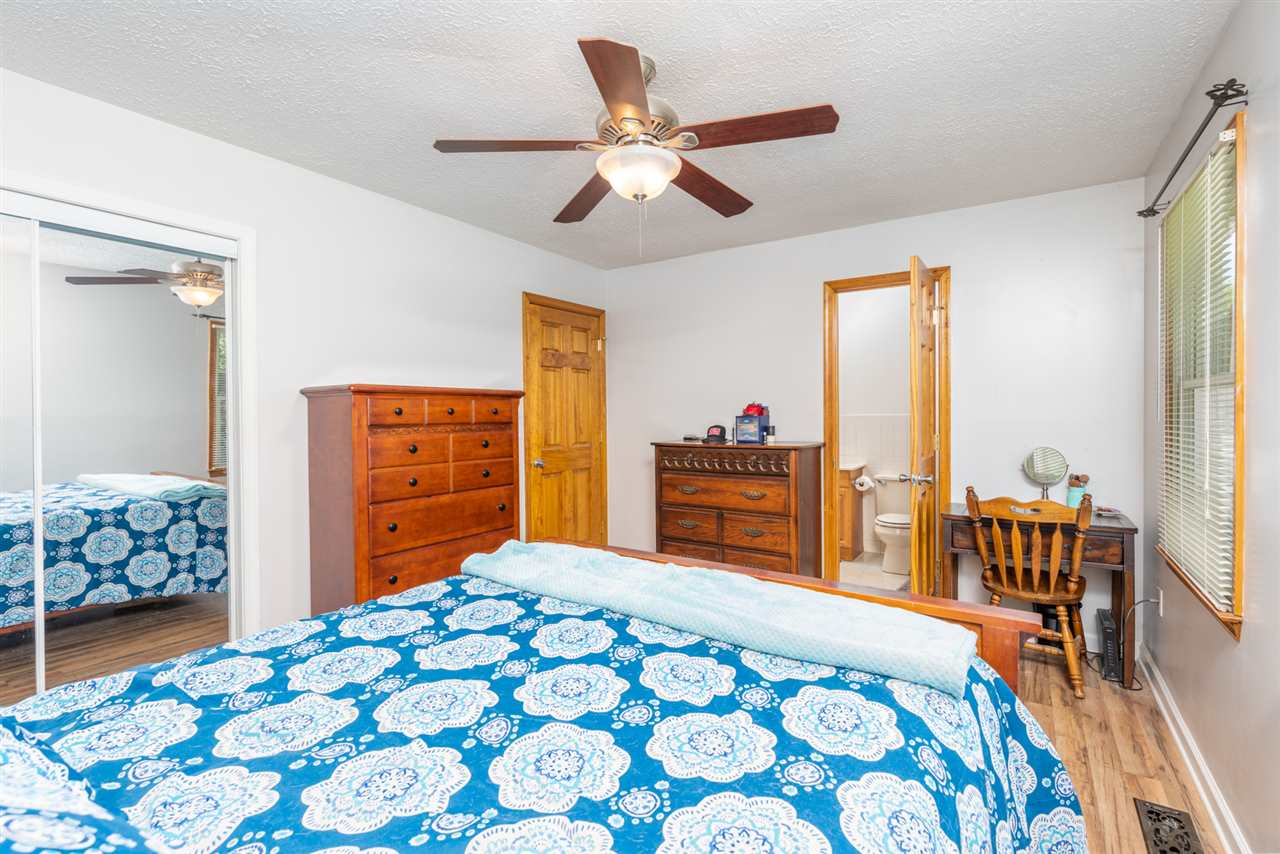 104 Buckboard Road Waynesboro, VA 22980 - Photo 26 of 43 a bedroom with a bed and a dresser in it