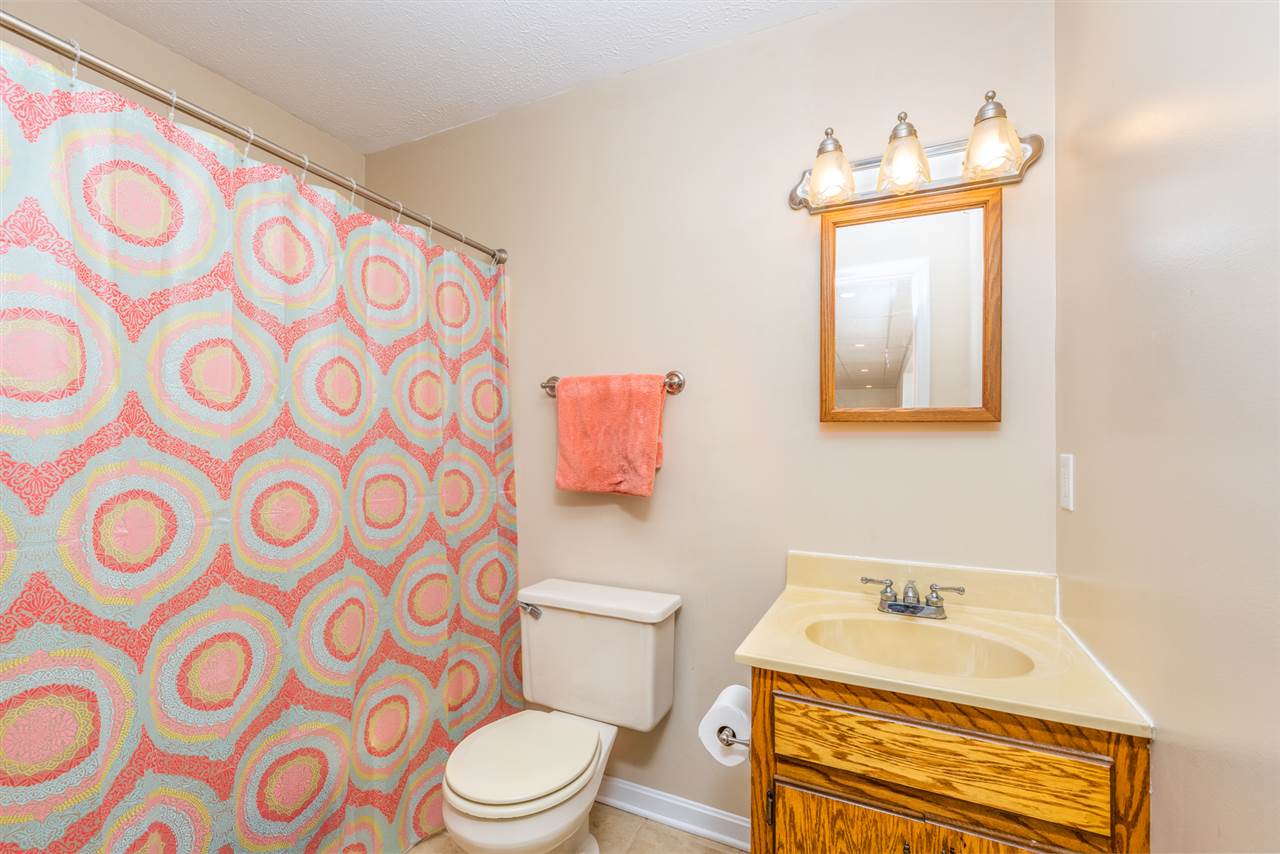 104 Buckboard Road Waynesboro, VA 22980 - Photo 27 of 43 a bathroom with a sink toilet and a mirror