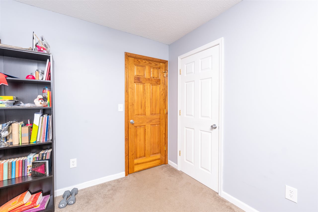 104 Buckboard Road Waynesboro, VA 22980 - Photo 30 of 43 a view of walk in closet with clothes and shoes