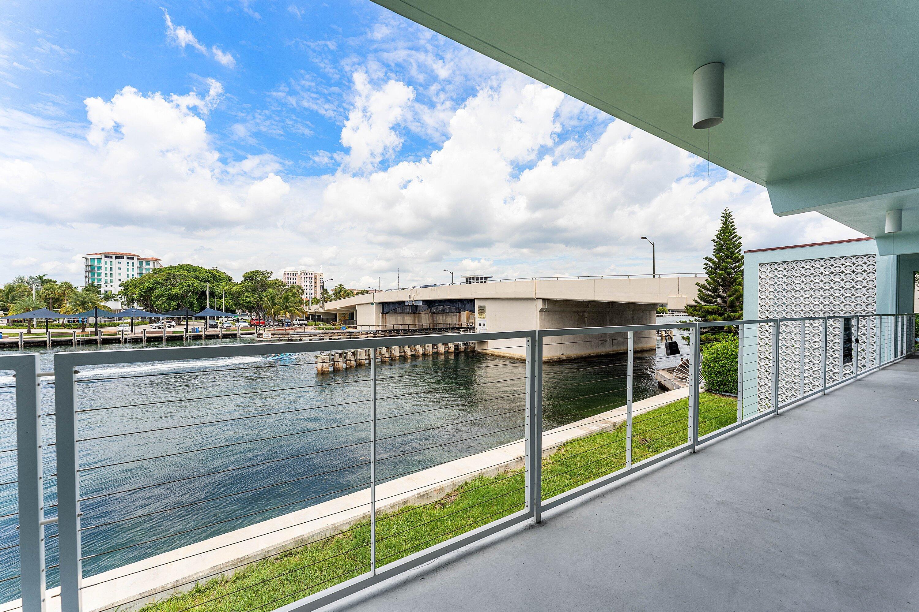 65 Southeast Spanish Trail, Unit 2030 Boca Raton, FL 33432 - Photo 24 of 28 Catwalk Facing Bridge