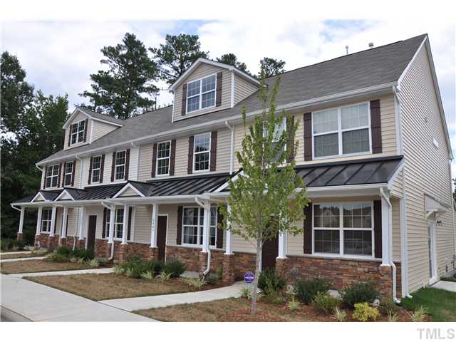 2403 Savior Street, Unit LT170 Raleigh, NC 27610 - Photo 1 of 9 a front view of a house with yard and green space