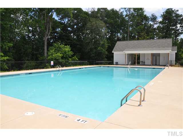 2403 Savior Street, Unit LT170 Raleigh, NC 27610 - Photo 8 of 9 a view of a swimming pool with a backyard