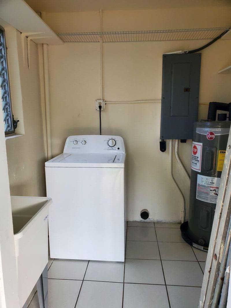 1228 11th Street Key West, FL 33040 - Photo 17 of 17 a utility room with dryer and washer