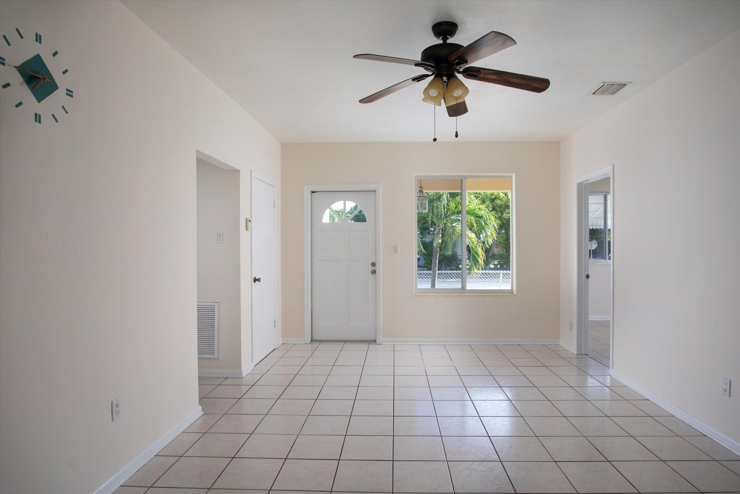 1228 11th Street Key West, FL 33040 - Photo 3 of 17 a view of an empty room and window