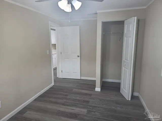 a view of a livingroom with wooden floor