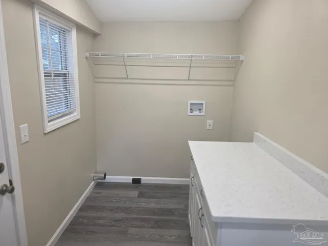 a view of small space with racks on the wall