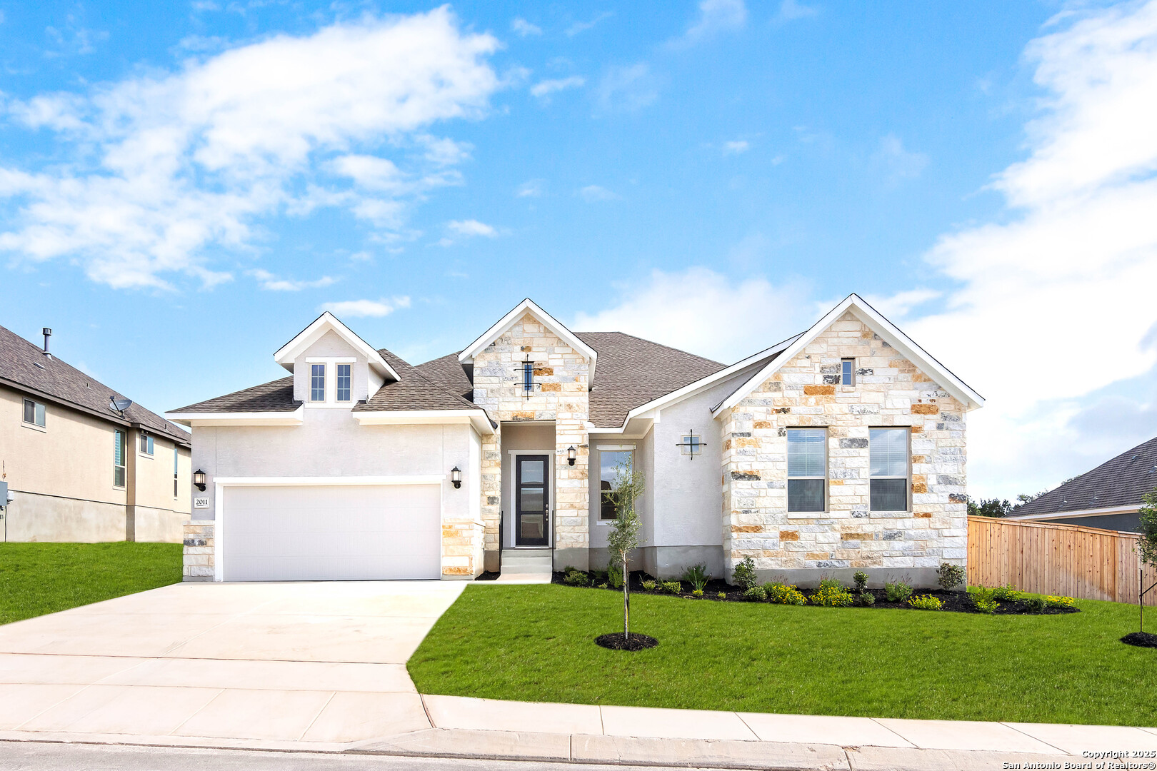a view of house with yard