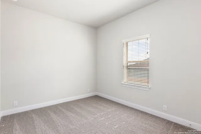 a bathroom with a granite countertop sink toilet a large mirror a shower and a bathtub