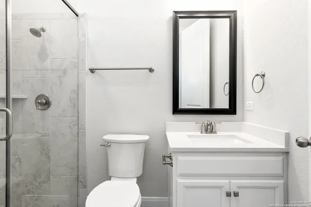 a view of a backyard with a garden and plants