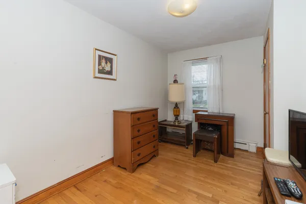 a room with furniture and a flat screen tv
