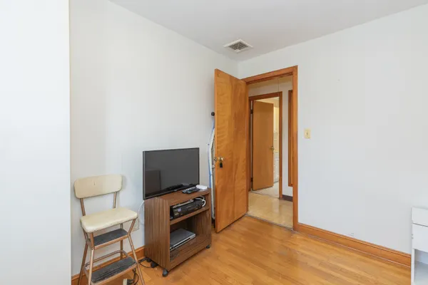 a view of room with a flat screen tv