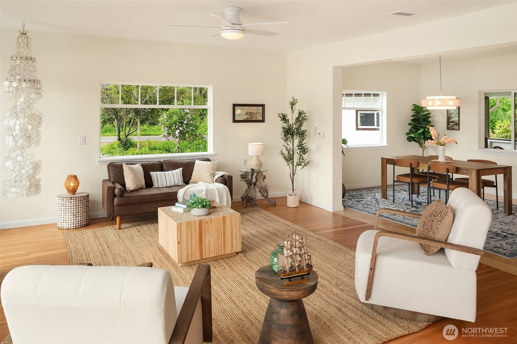22113 Dockton Road Southwest Vashon, WA 98070 - Photo 21 of 40 a living room with furniture and a large window