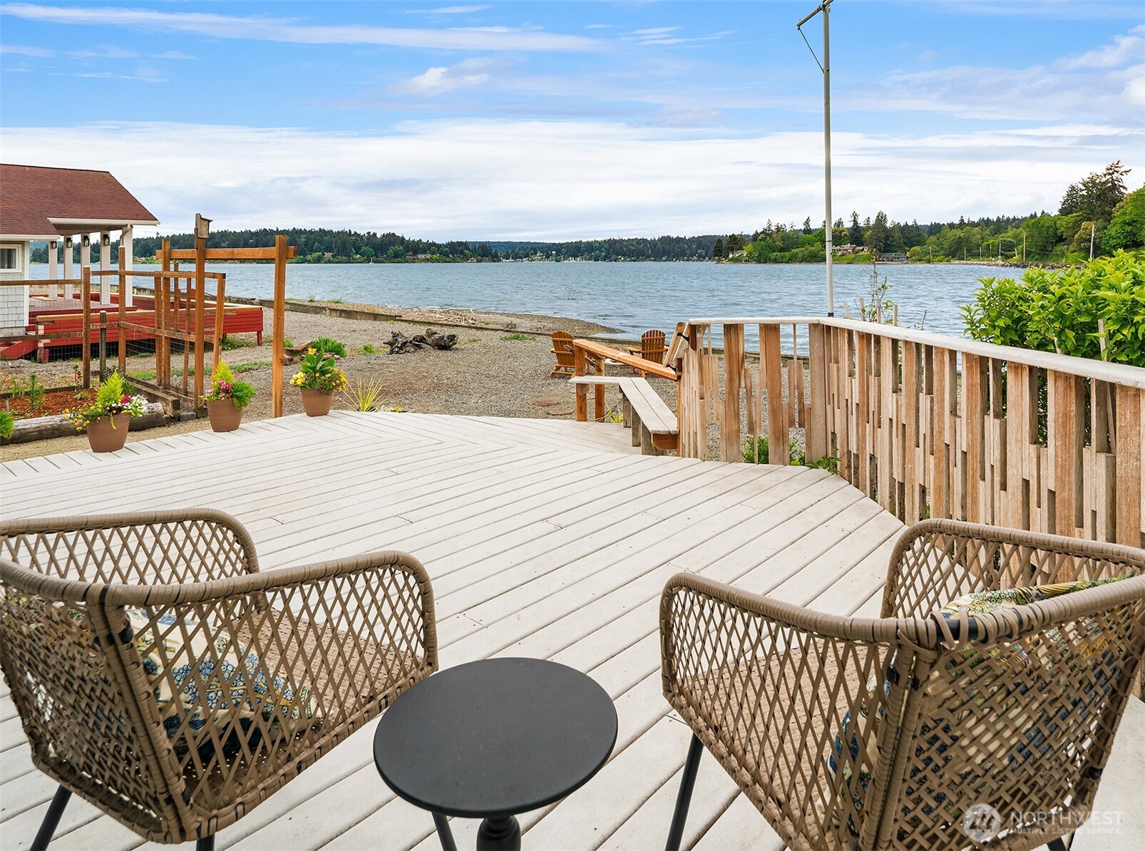 22113 Dockton Road Southwest Vashon, WA 98070 - Photo 39 of 40 a view of a roof deck with couches chairs dining table and chairs