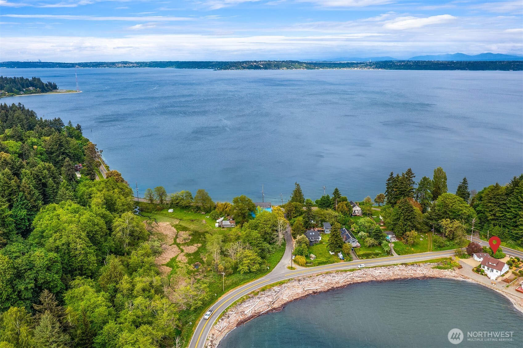 22113 Dockton Road Southwest Vashon, WA 98070 - Photo 4 of 40 a view of a street with an ocean