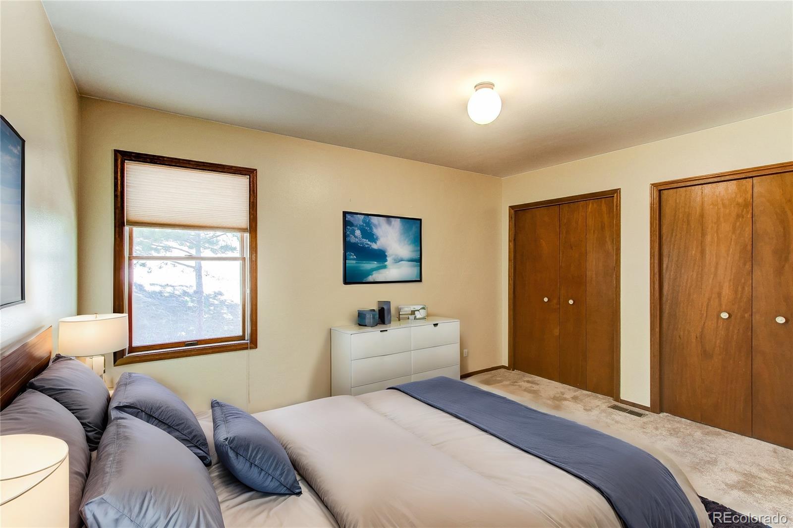 63 Plains View Road Boulder, CO 80302 - Photo 22 of 48 a bedroom with a bed and a couch