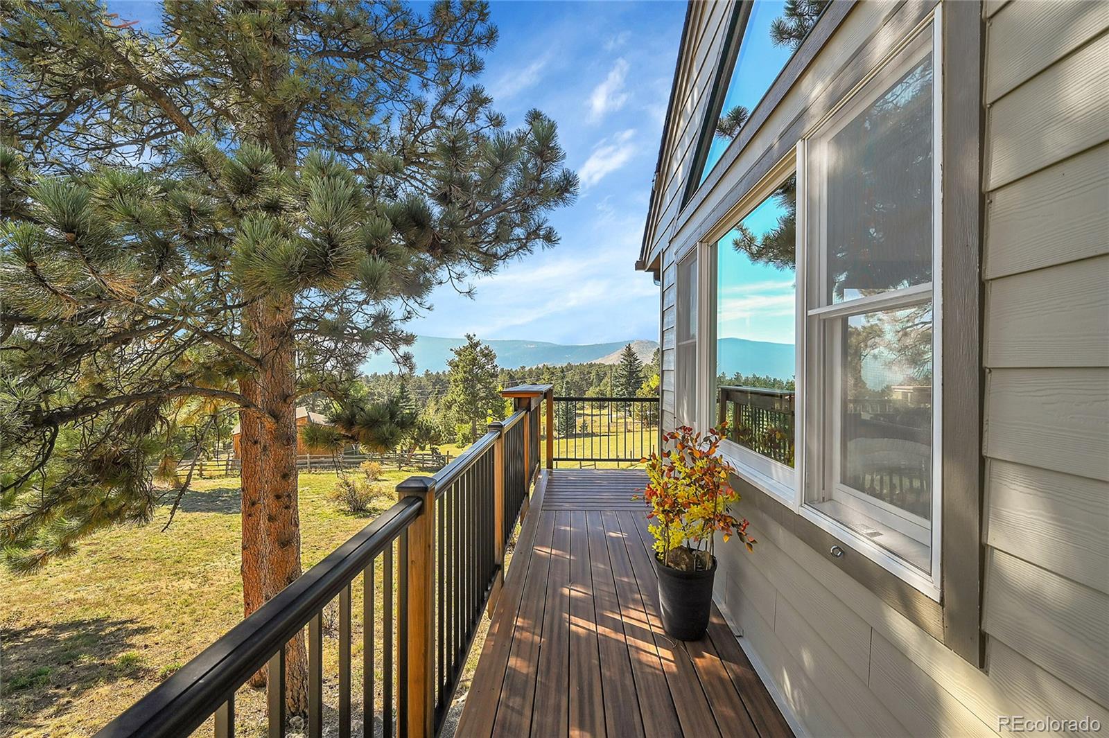 63 Plains View Road Boulder, CO 80302 - Photo 4 of 48 a view of balcony with couch