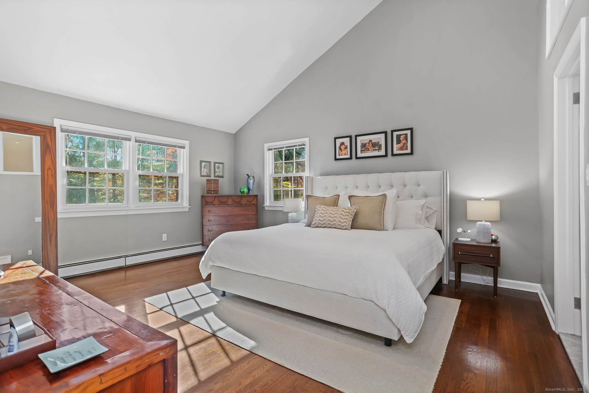 5 Willow Walk Road Westport, CT 06880 - Photo 20 of 40 a spacious bedroom with a bed and a window
