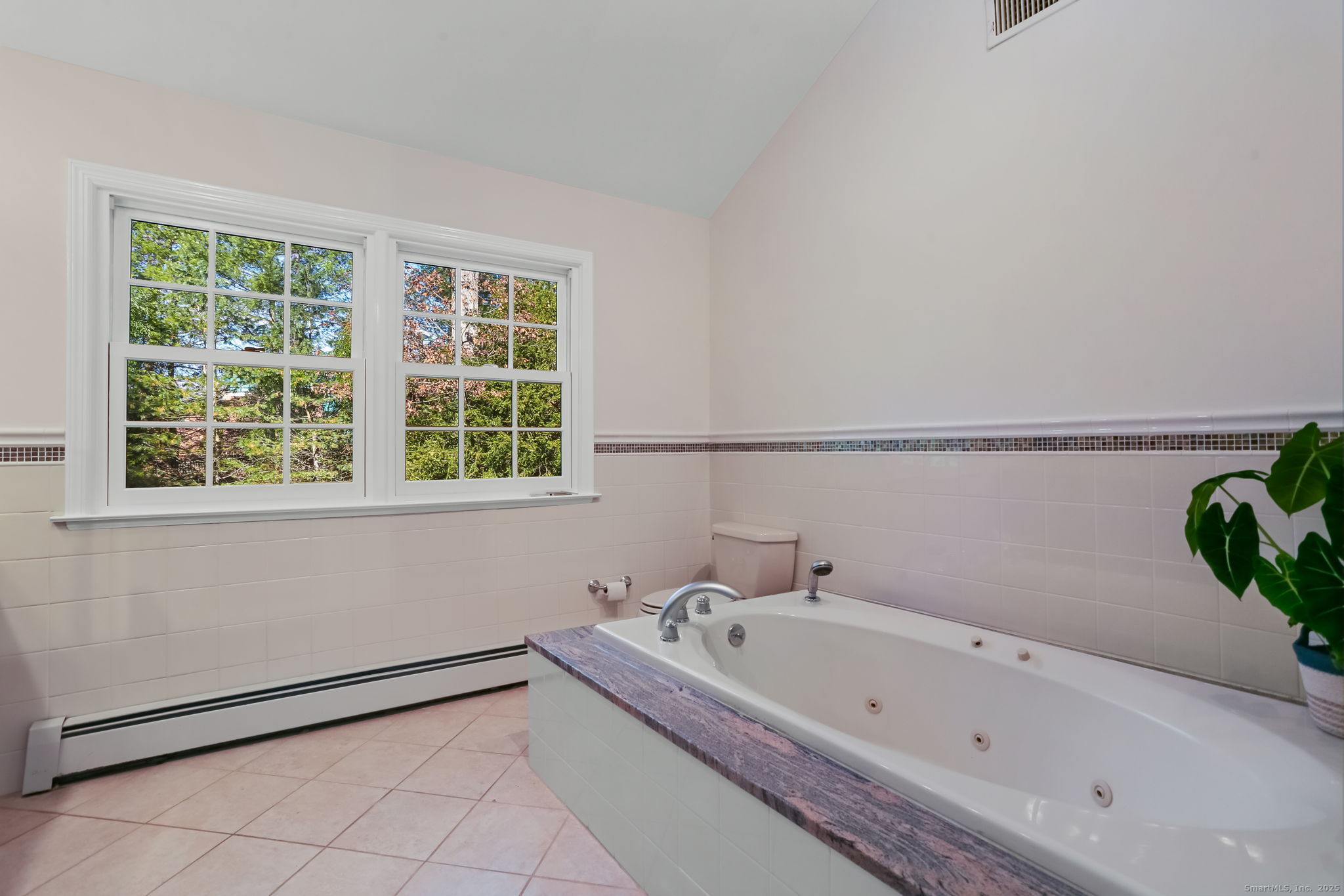 5 Willow Walk Road Westport, CT 06880 - Photo 23 of 40 a bathroom with a bathtub and shower