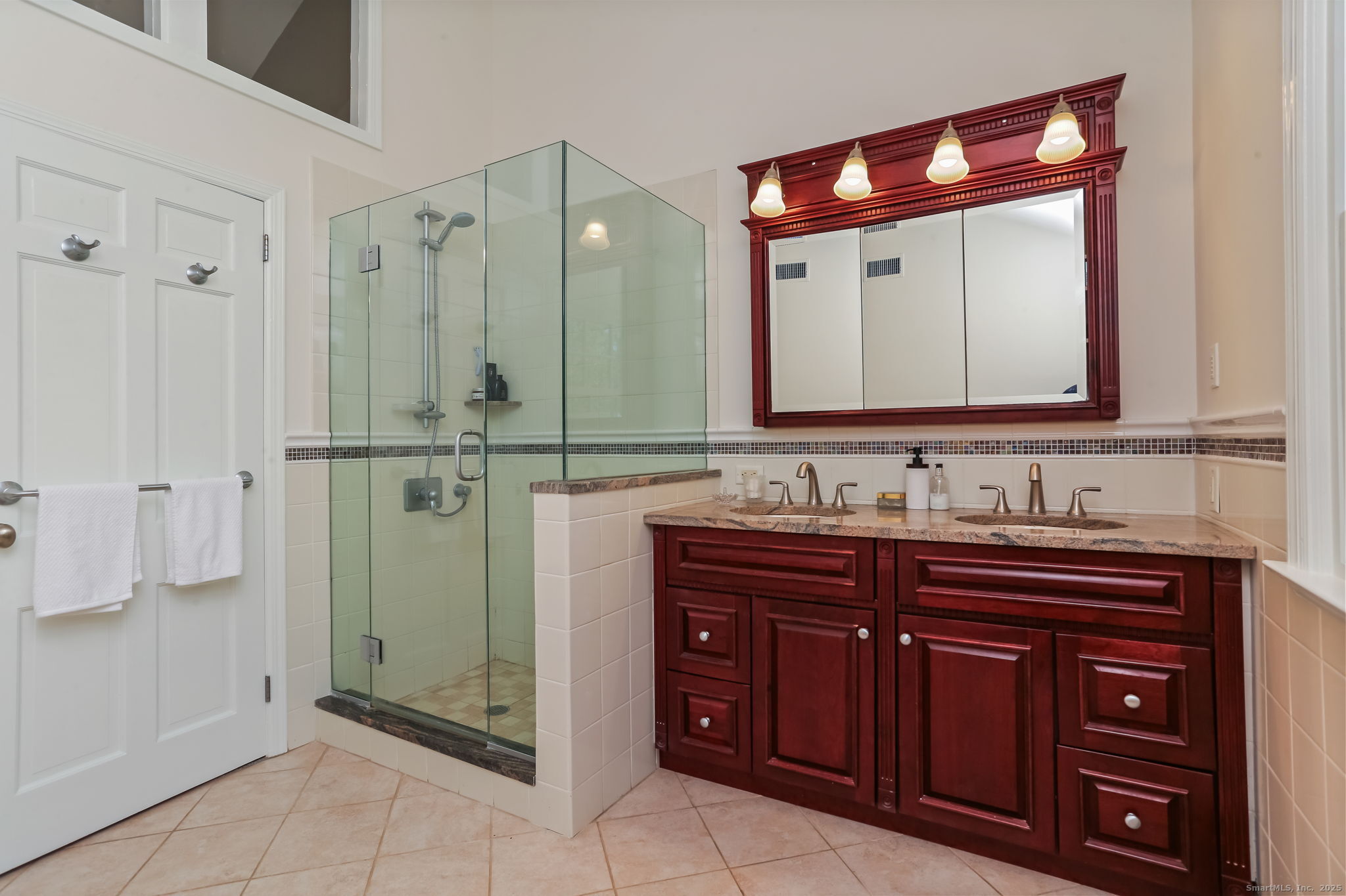 5 Willow Walk Road Westport, CT 06880 - Photo 24 of 40 a bathroom with a sink and a mirror