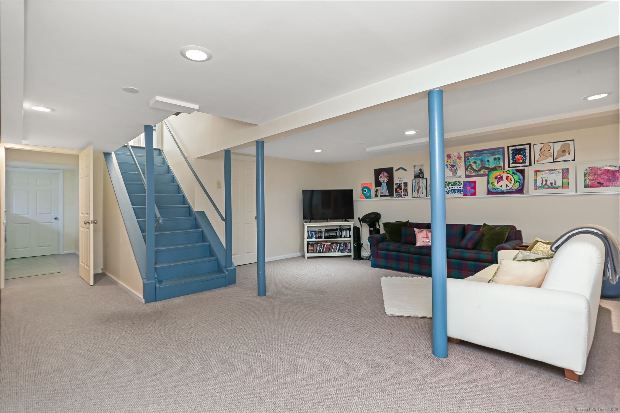 5 Willow Walk Road Westport, CT 06880 - Photo 29 of 40 a living room with furniture and stairs