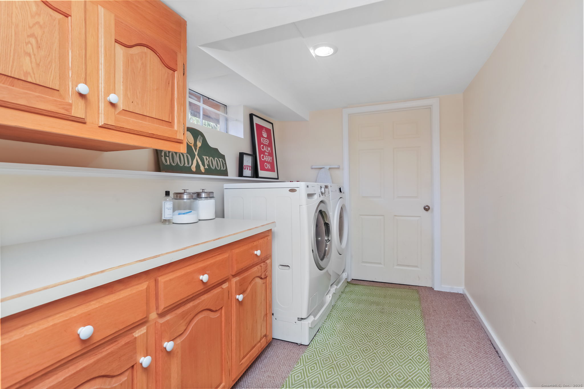 5 Willow Walk Road Westport, CT 06880 - Photo 31 of 40 a utility room with cabinets washer and dryer