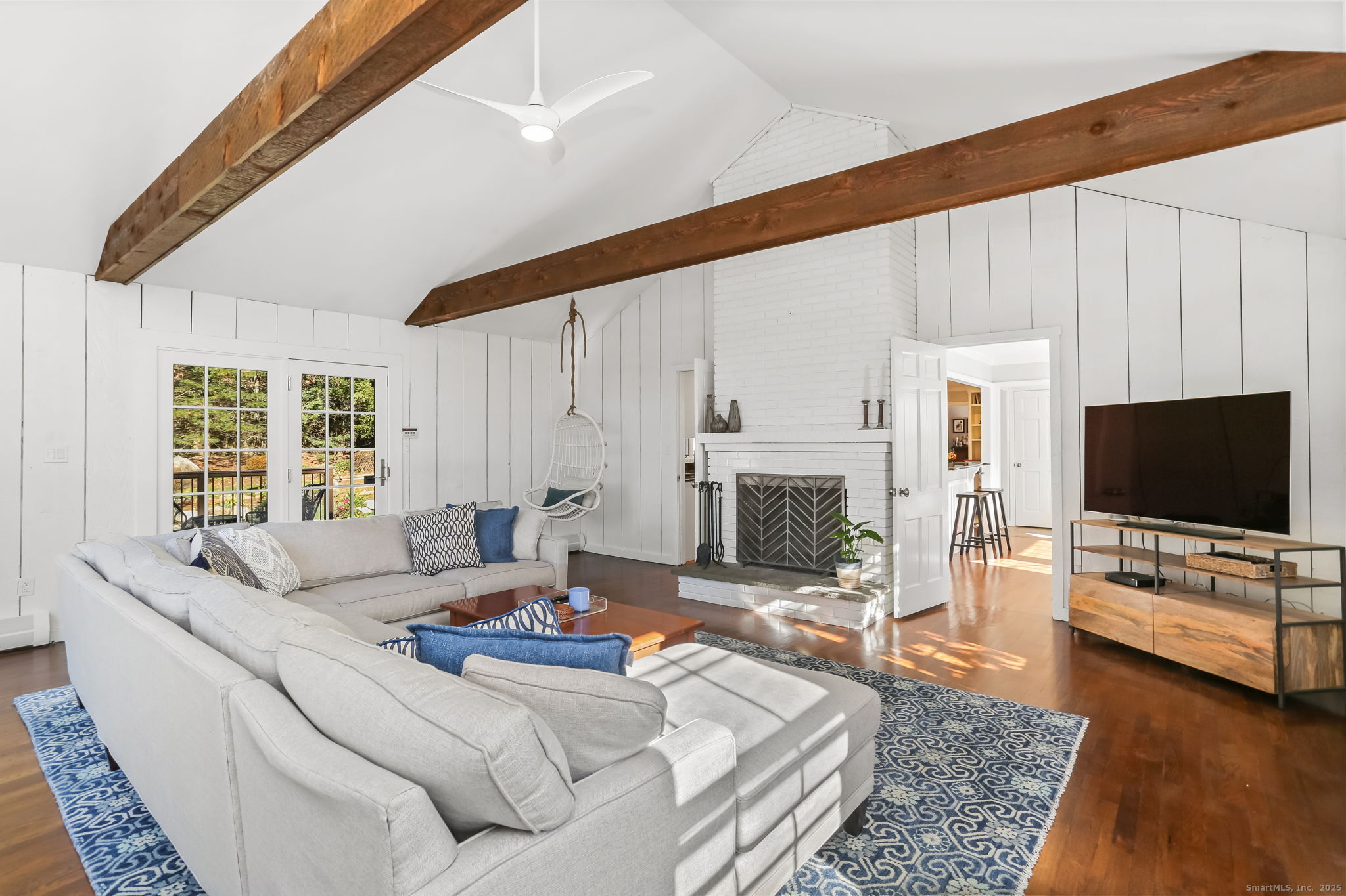 5 Willow Walk Road Westport, CT 06880 - Photo 6 of 40 a living room with furniture and a flat screen tv