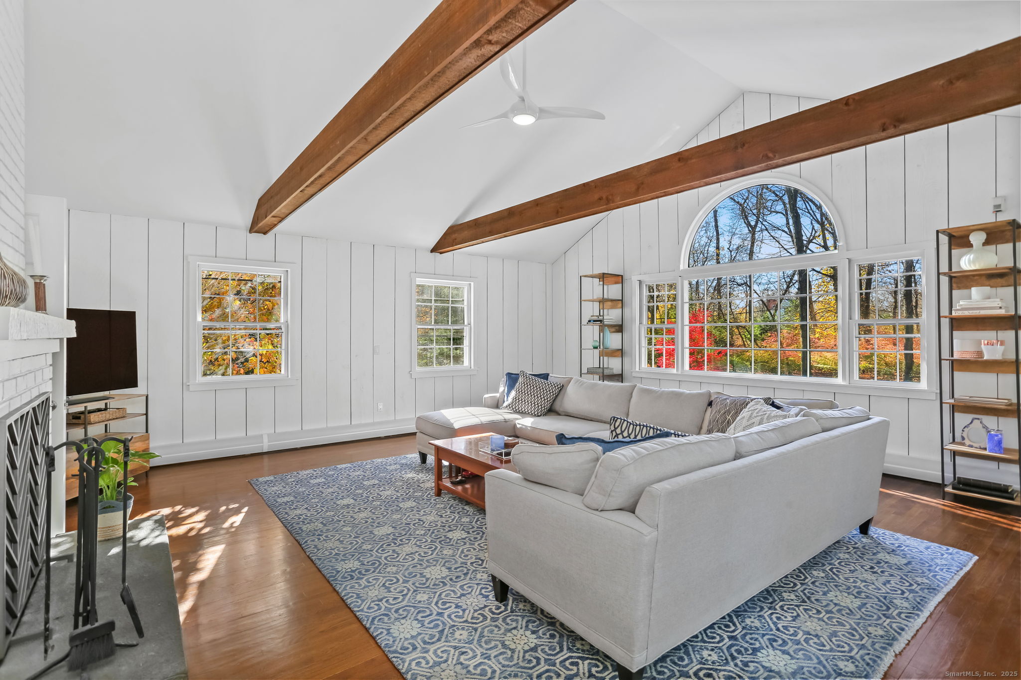 5 Willow Walk Road Westport, CT 06880 - Photo 7 of 40 a living room with furniture and flat screen tv