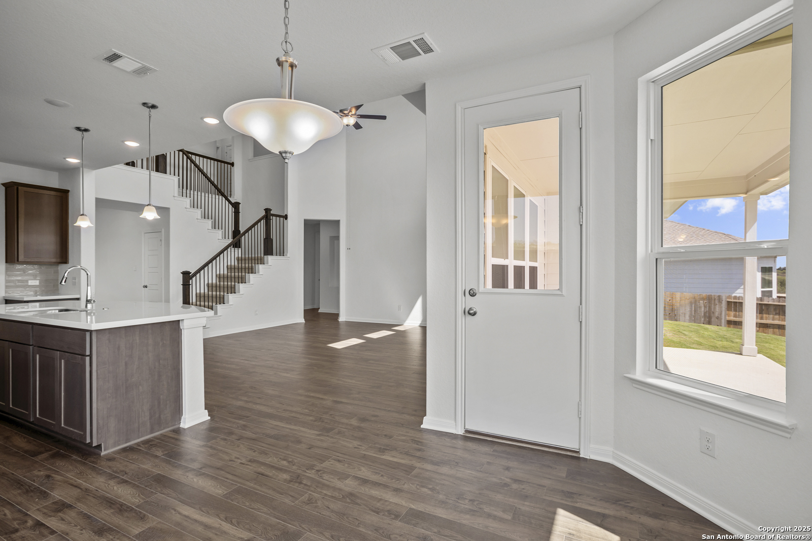2804 Reeves Lane Schertz, TX 78108 - Photo 16 of 44 a view of entryway and hall with wooden floor