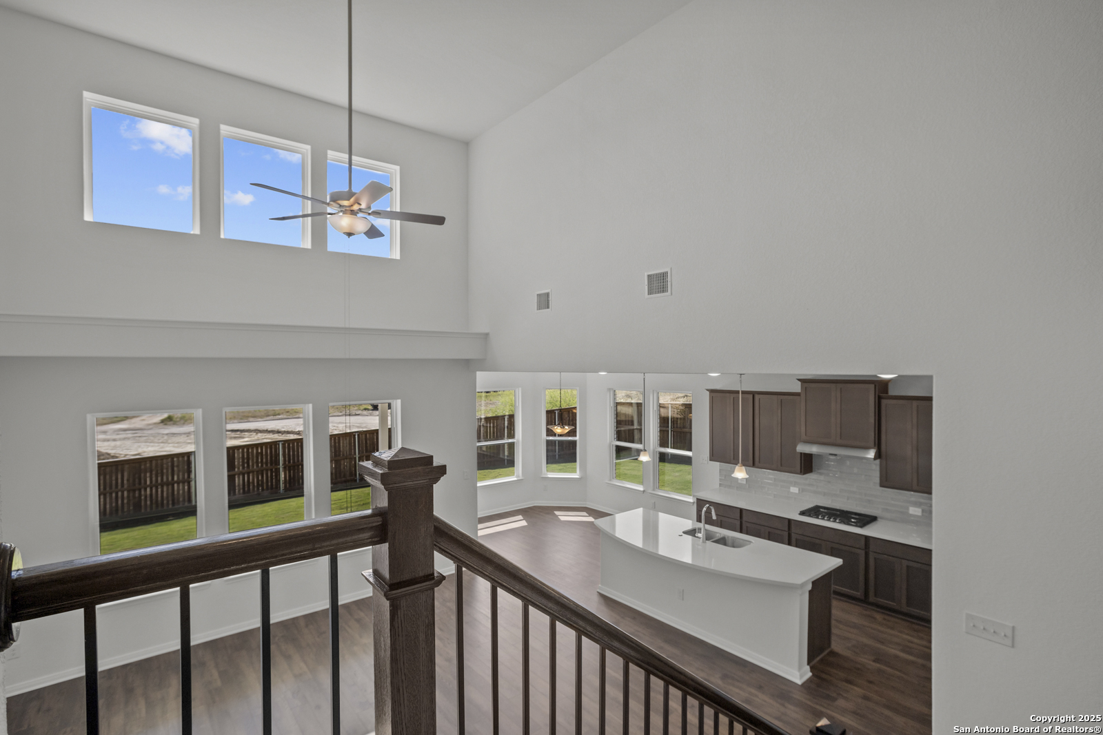 2804 Reeves Lane Schertz, TX 78108 - Photo 28 of 44 a view of a dining room with furniture window and wooden floor