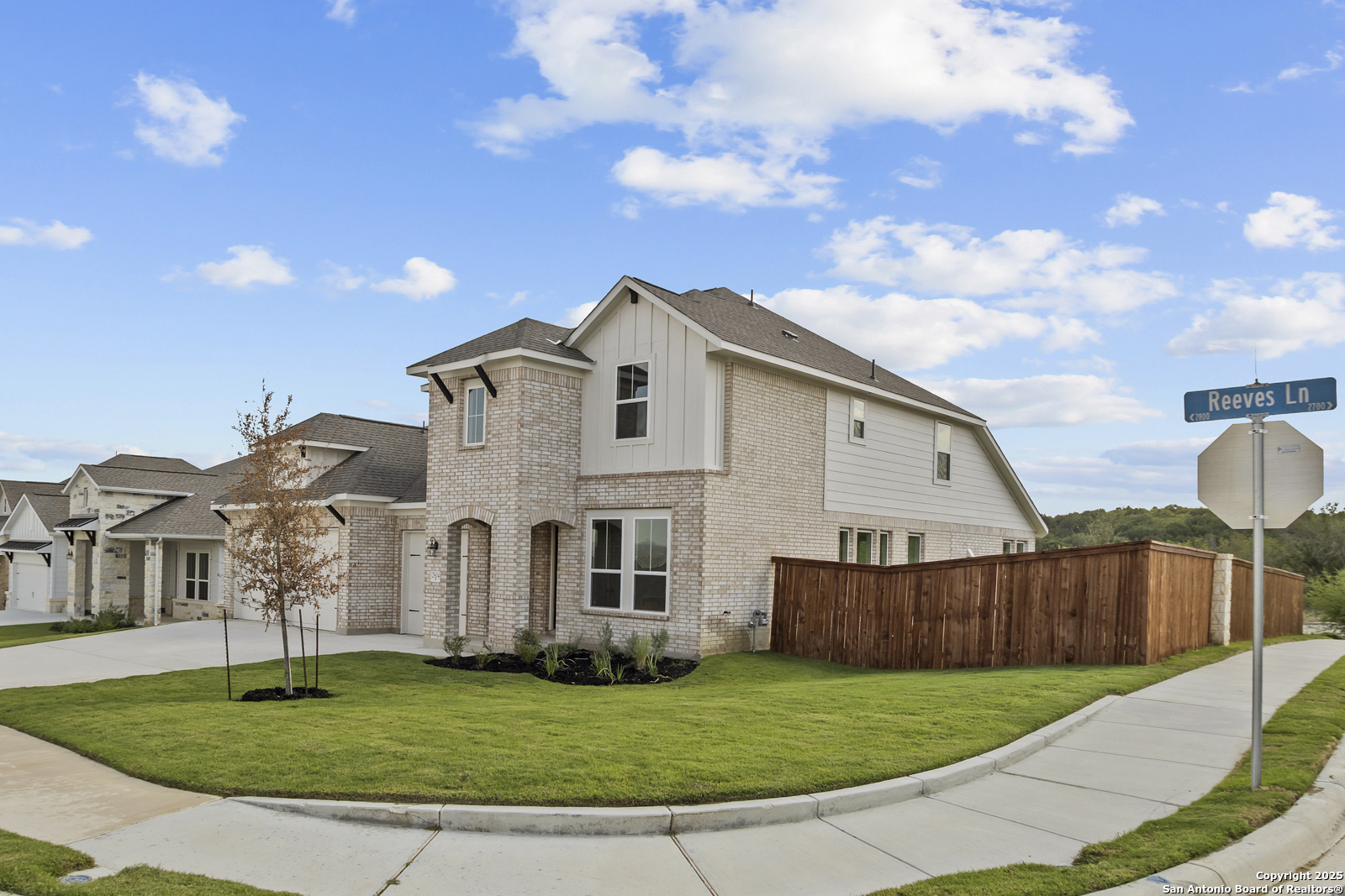 2804 Reeves Lane Schertz, TX 78108 - Photo 3 of 44 a view of a white house with a yard and table and chairs