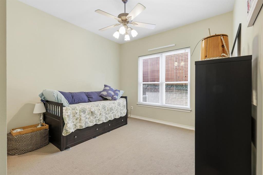 1311 Wilderness Street Denton, TX 76205 - Photo 28 of 40 a living room with furniture and a window