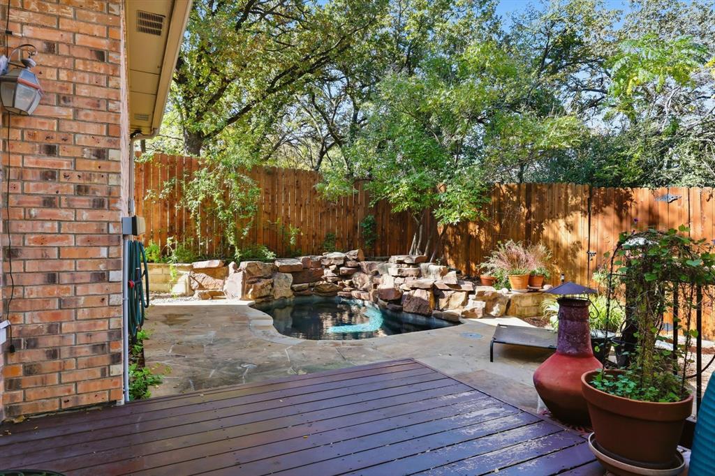 1311 Wilderness Street Denton, TX 76205 - Photo 33 of 40 a view of a patio with couches and potted plants