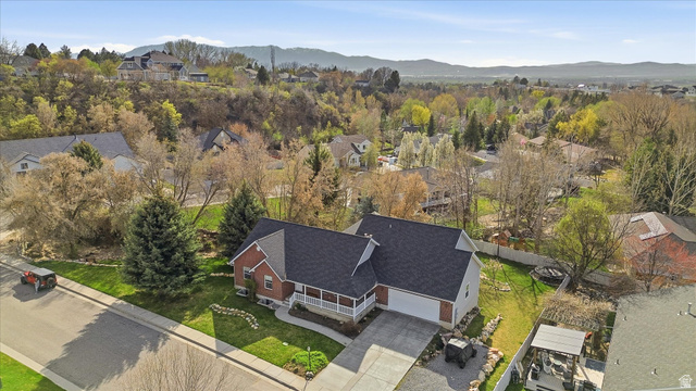 353 Robin Street Smithfield, UT 84335 - Photo 65 of 70 Aerial perspective of suburban area with a mountain backdrop