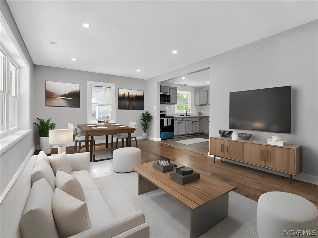 948 Barlen Drive Richmond, VA 23225 - Photo 7 of 12 a living room with furniture and a flat screen tv