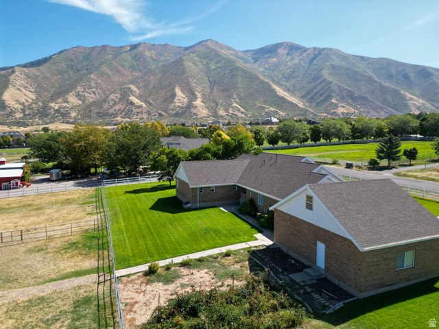 1060 West 2620th Street South Mapleton, UT 84664 - Photo 54 of 87 Aerial view of property and surrounding area featuring a mountain backdrop